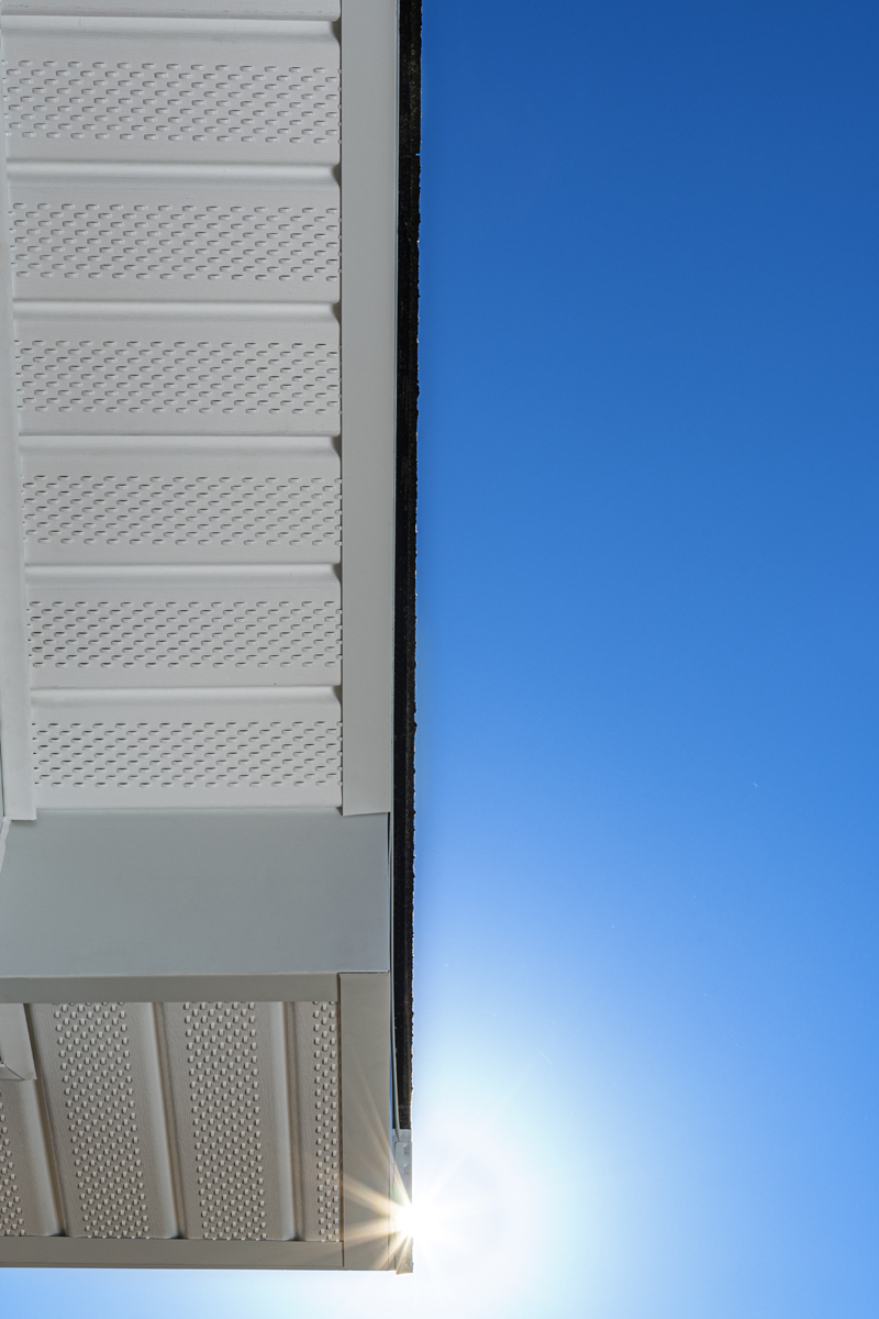 Aluminum Fascia and Vinyl Perforated Soffit Viewed From Ground-Level.