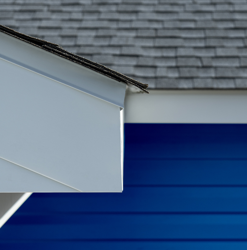 Aluminum Fascia and Perforated Soffit, with Grey Asphalt Roofing Installation.